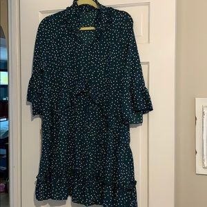 Polka dotted deep green and white dress